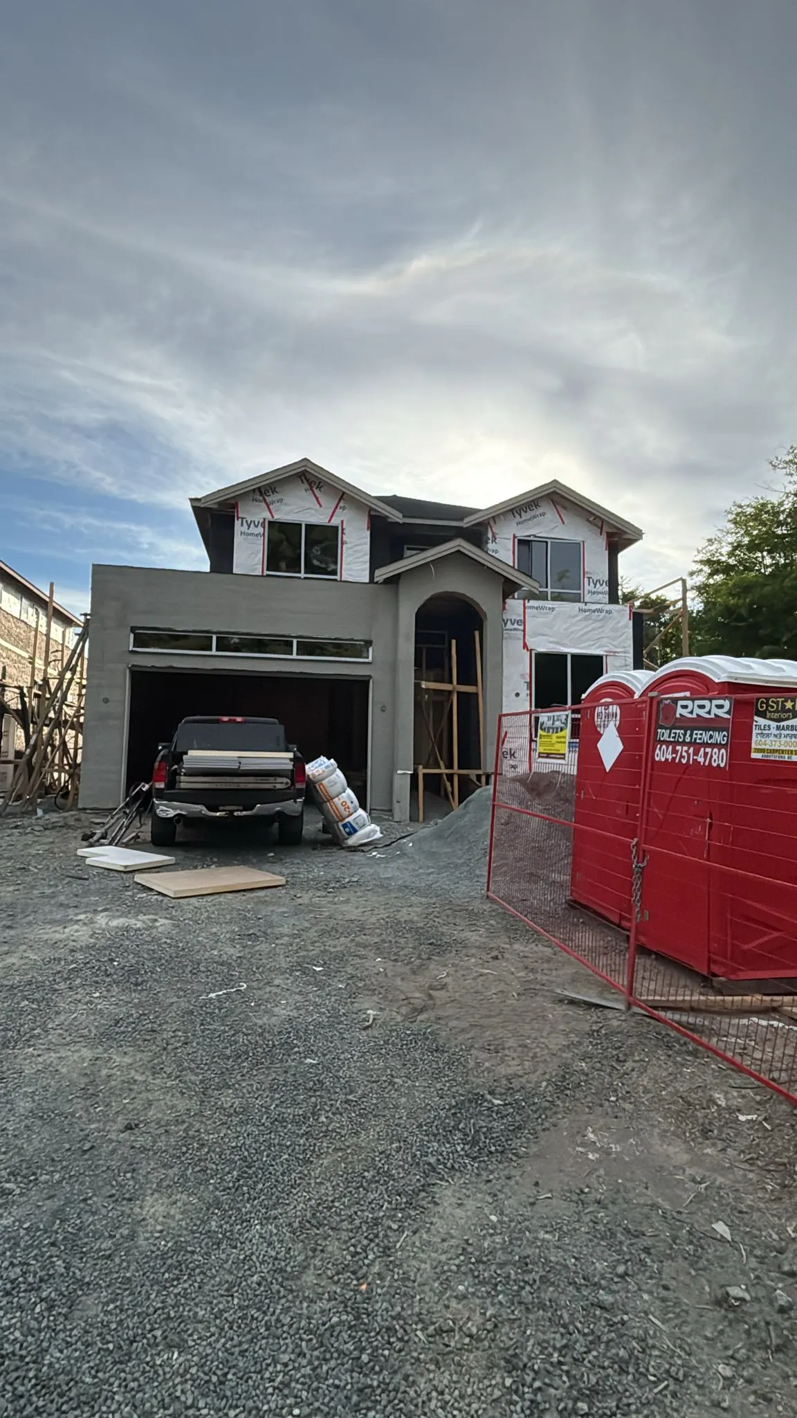 Completed new-build home at dusk insulated by Khaira Insulation