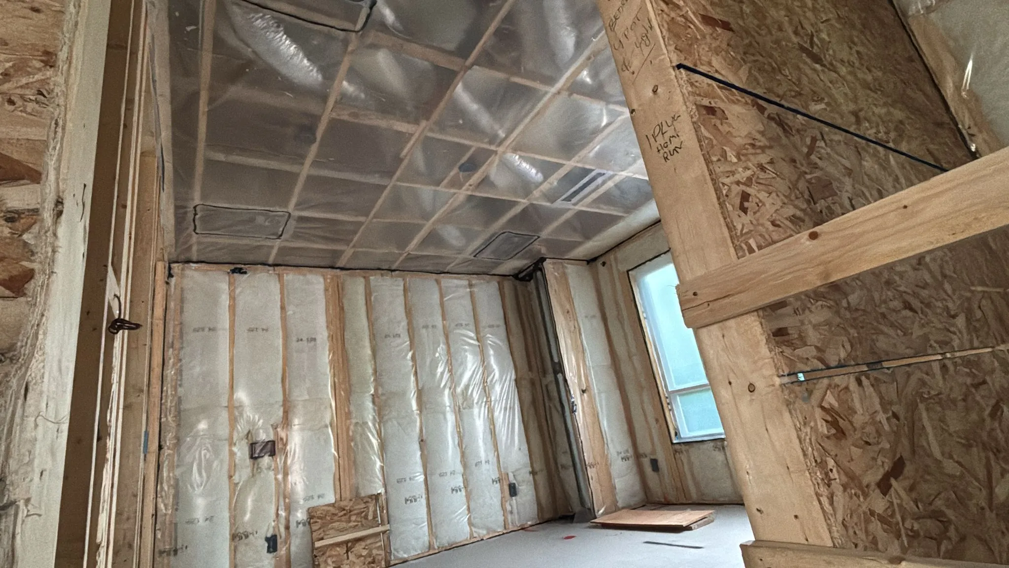 Spray foam insulation around a BC home rim joist